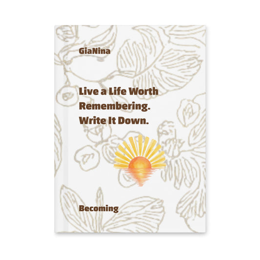 A hardcover Live a Life Worth Remembering journal by GiaNina, white cover with beige botanical line art