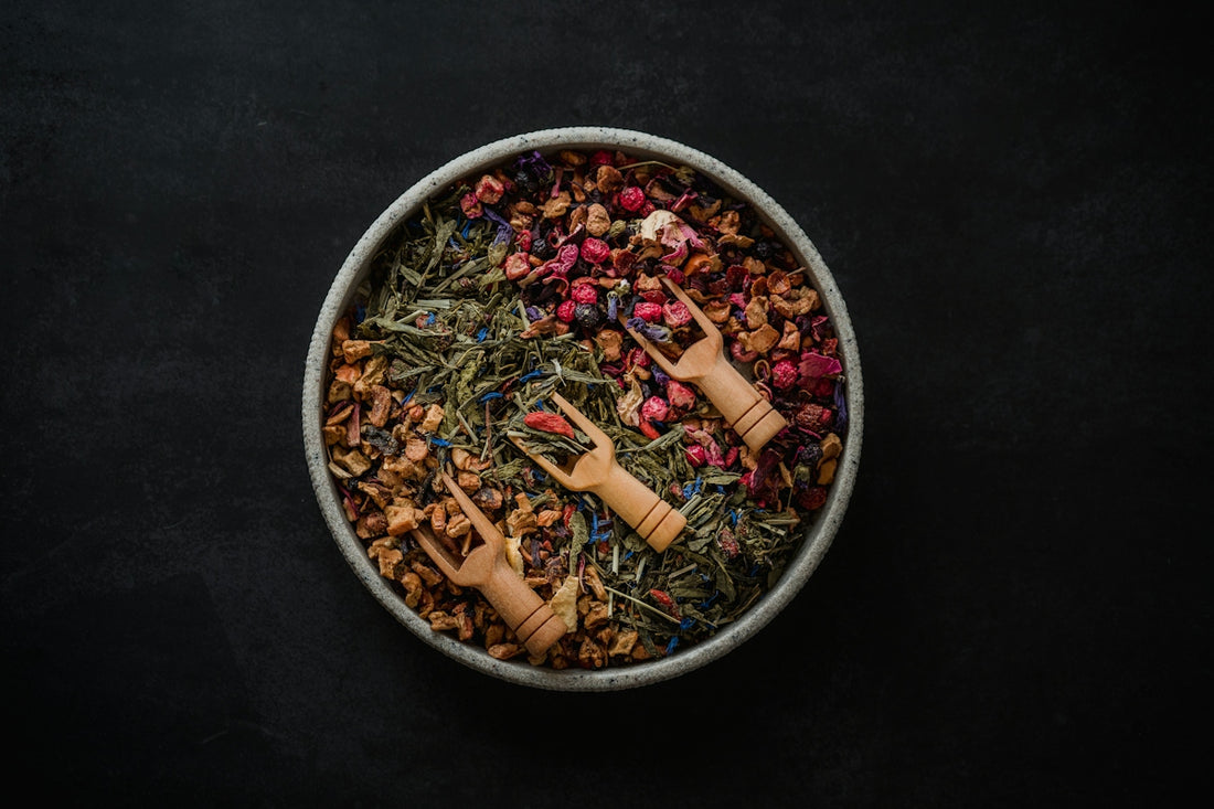 a bowl filled with various types of herbs
