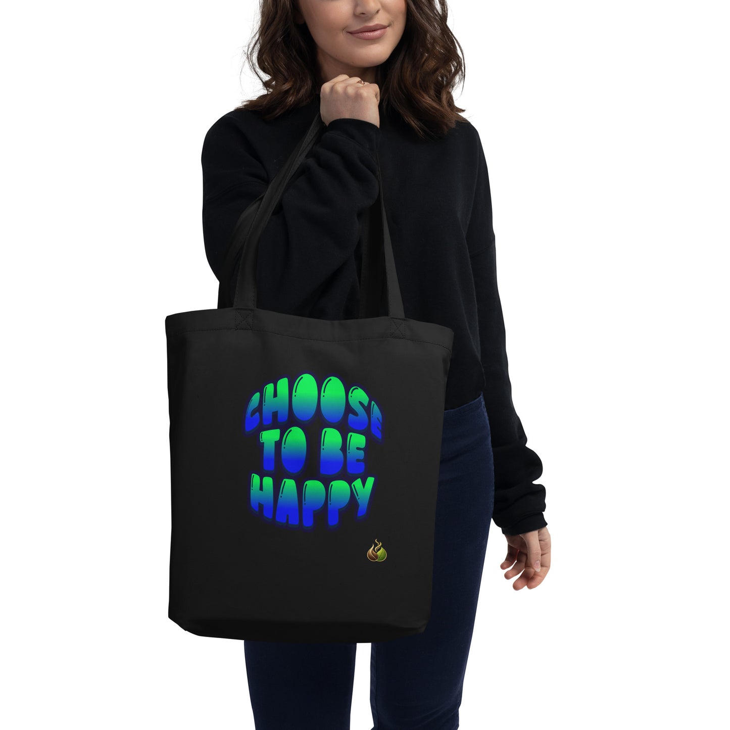 A woman wearing a black sweatshirt and dark blue jeans carries a black canvas tote bag with the text 'CHOOS TO BE HAPPY' in a blue-to-green gradient font, set against a plain white background.