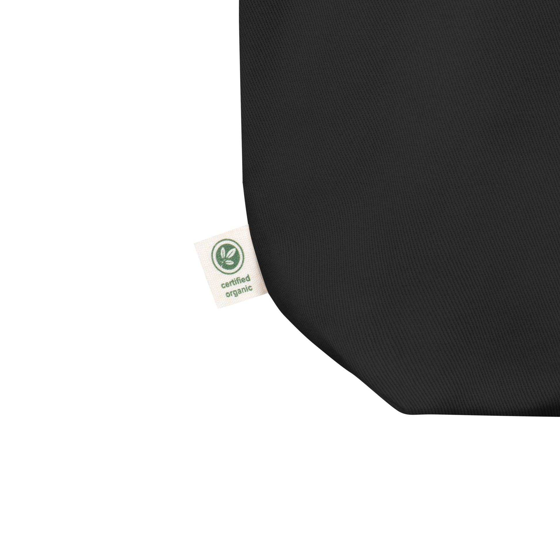Black product with a green certification label on a white background