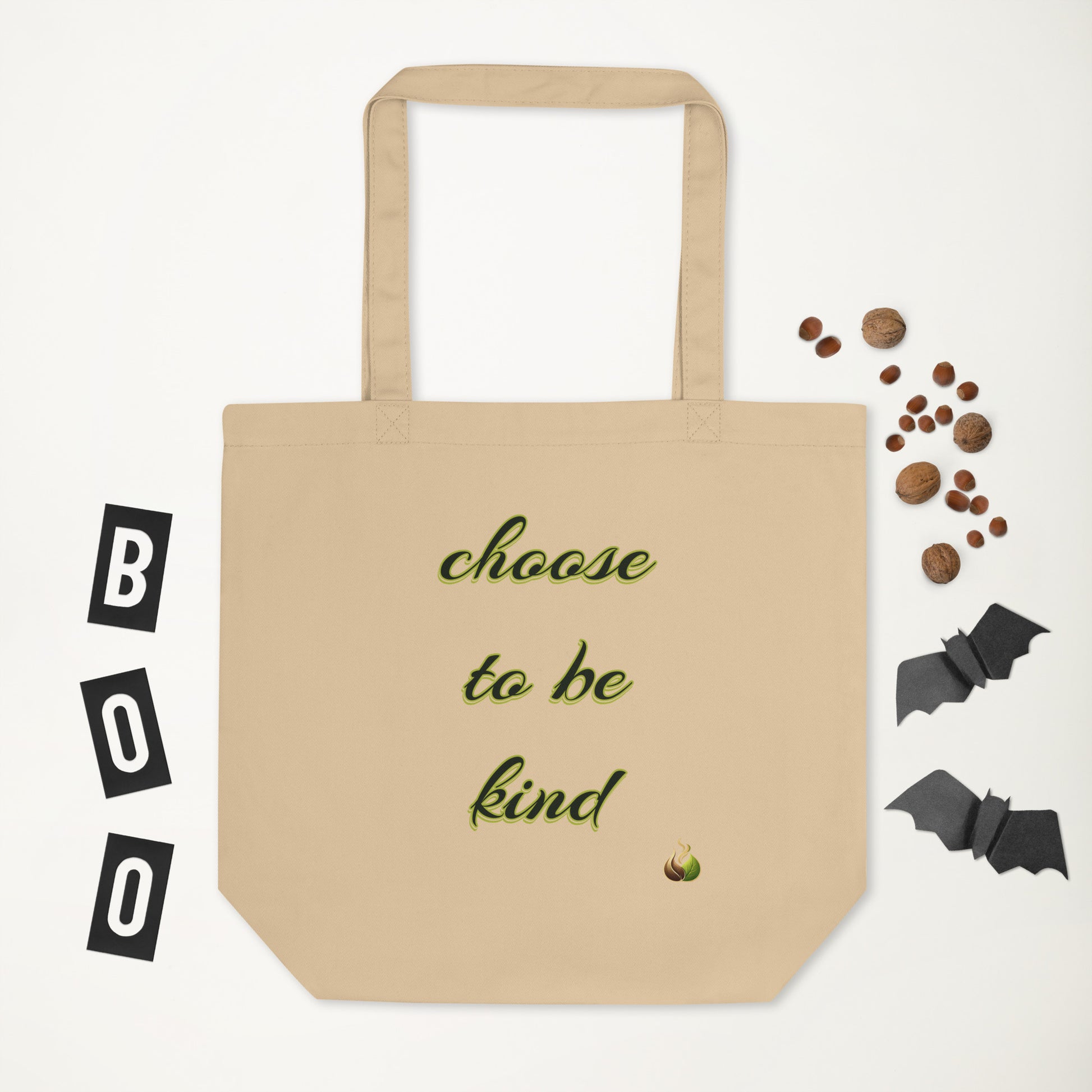 Beige tote bag with 'NO DUH!' text and Halloween-themed decorations on a white background