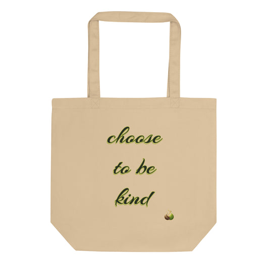 A beige canvas tote bag with the phrase 'choose to be kind' printed in green script on the front, accompanied by a small green and yellow graphic near the bottom right of the text, shown against a plain white background.