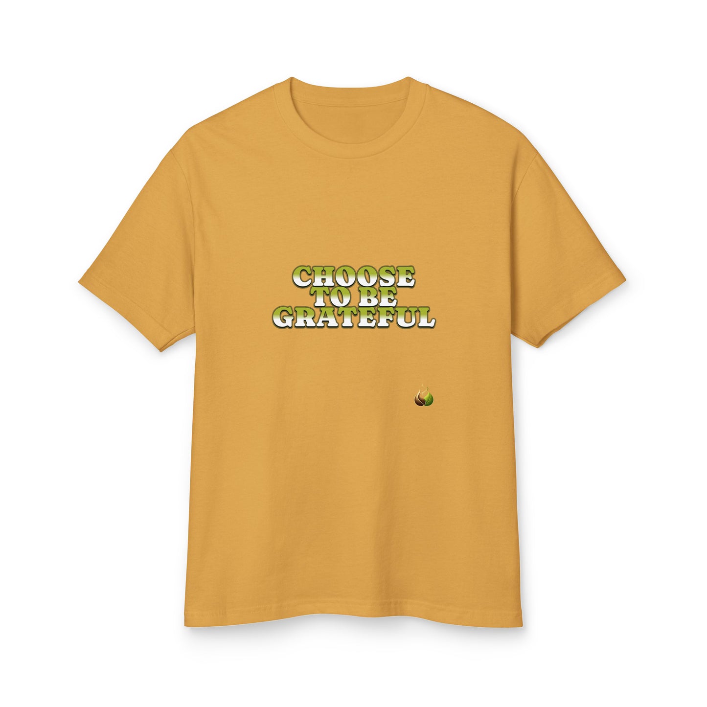 A mustard yellow short-sleeve t-shirt with the text 'CHOOSE TO BE GRATEFUL' printed in a green and gold gradient font on the chest, accompanied by a small green leaf graphic below. The t-shirt is displayed flat against a clean white background.